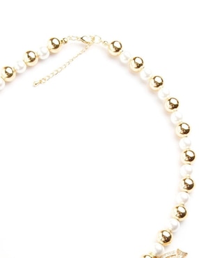 Collar de coral Yoiko Solarelle de baño de oro 18 K